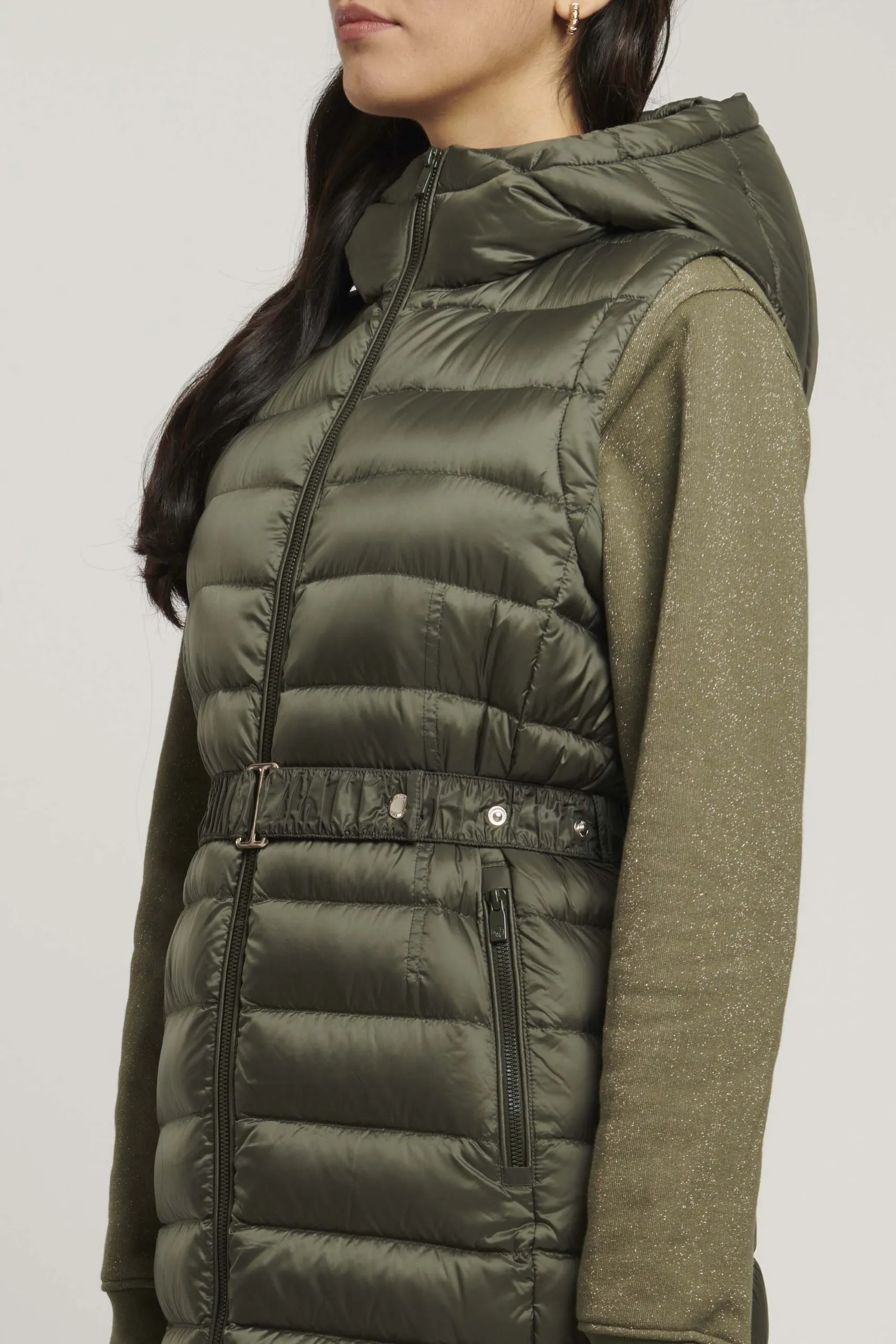 Green sleeveless down jacket with belt