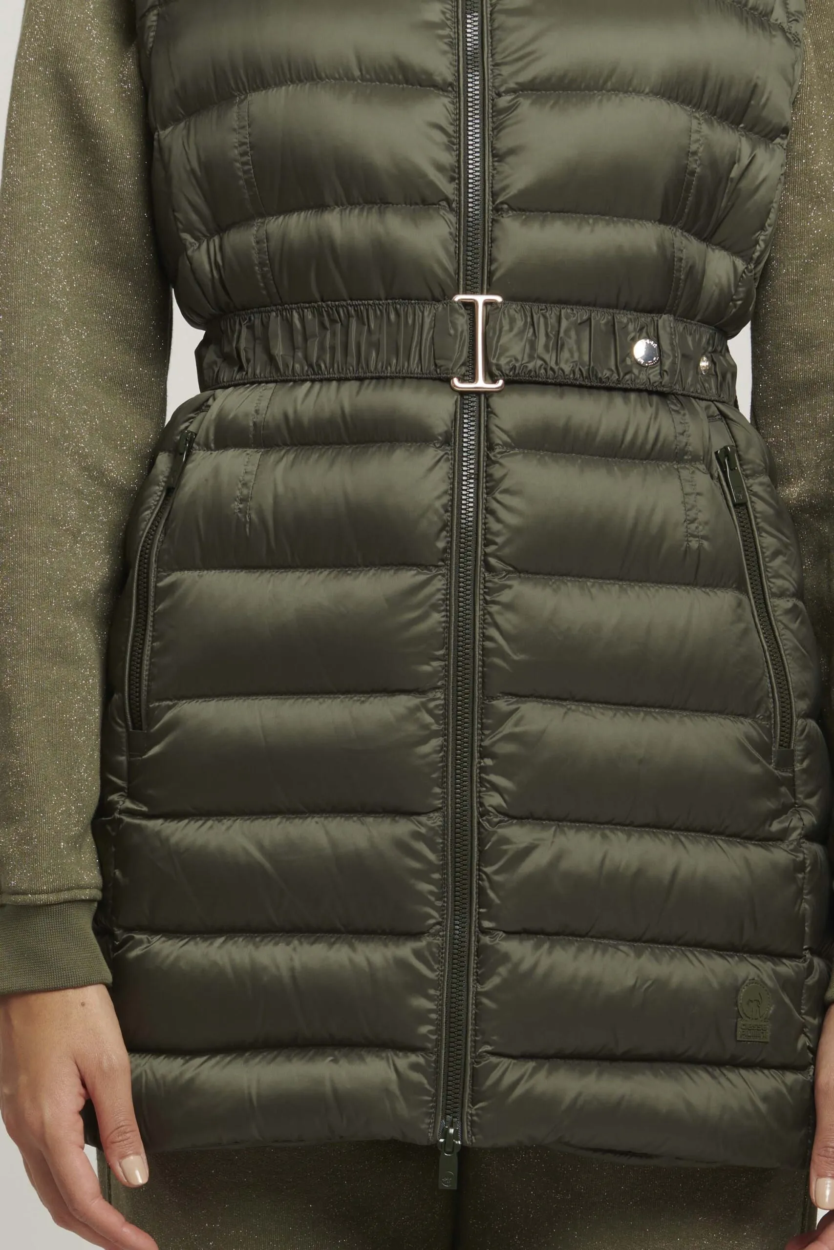 Green sleeveless down jacket with belt