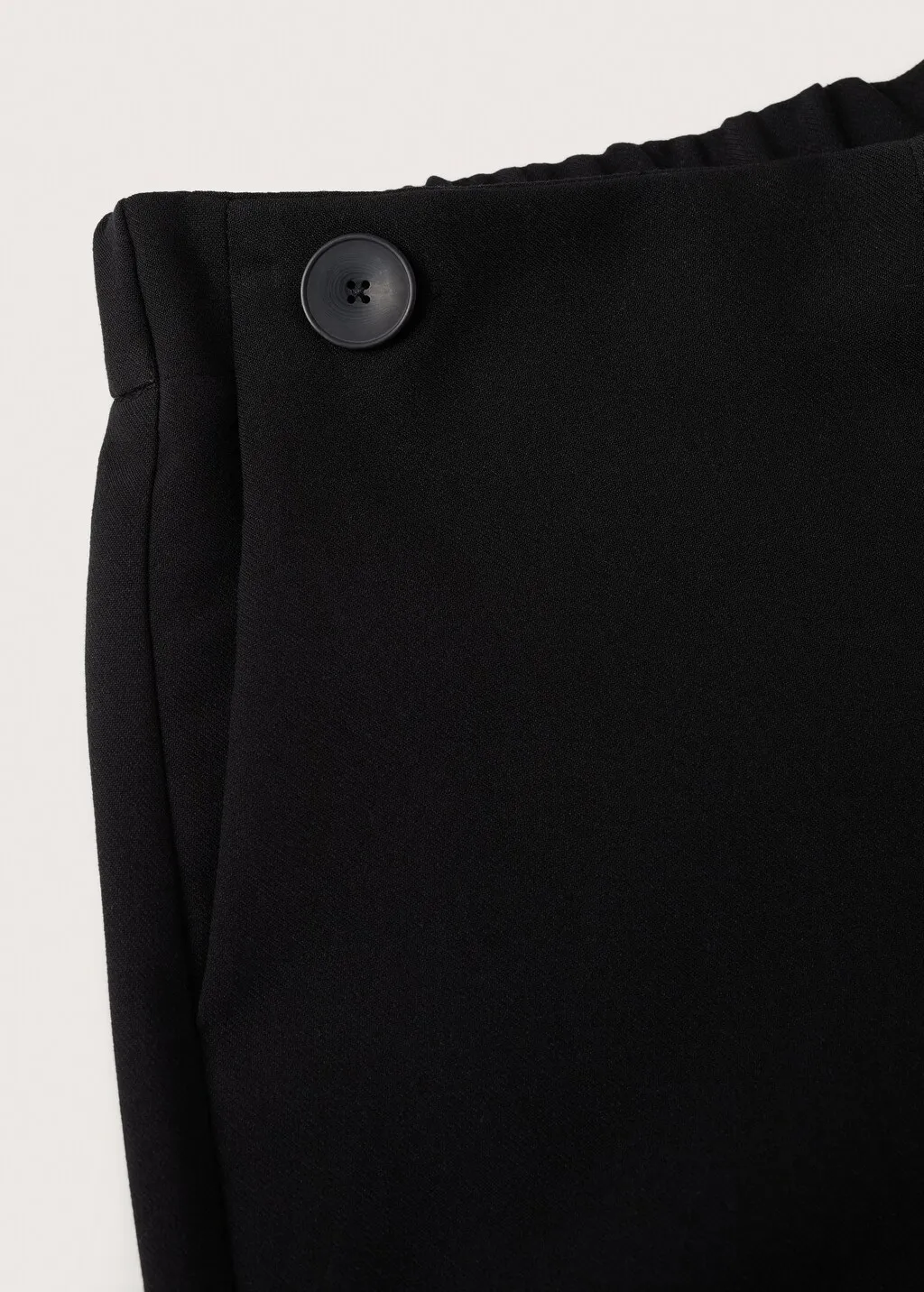 Pantaloni crop bottoni