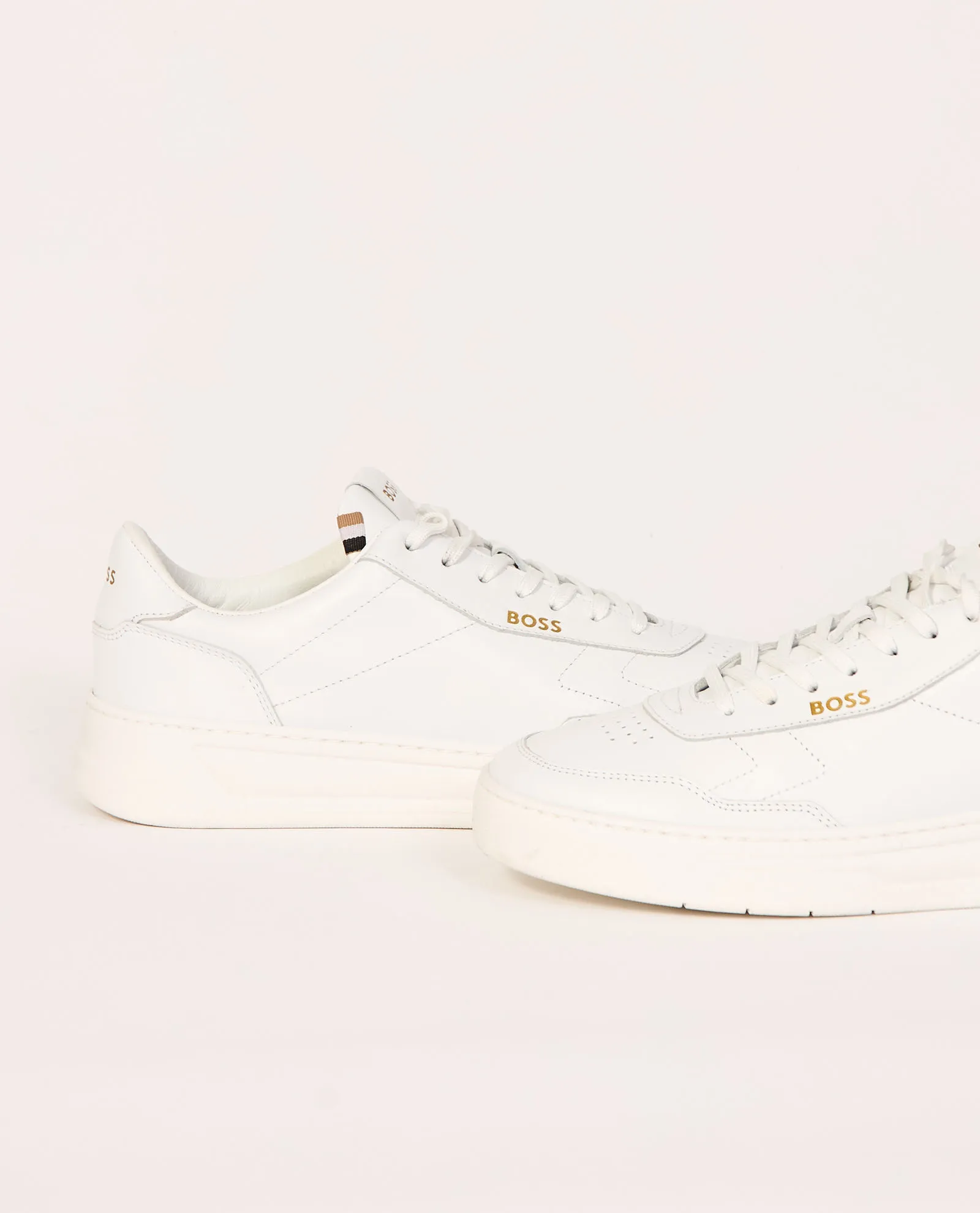 Sneakers basse uomo Boss con loghi dorati