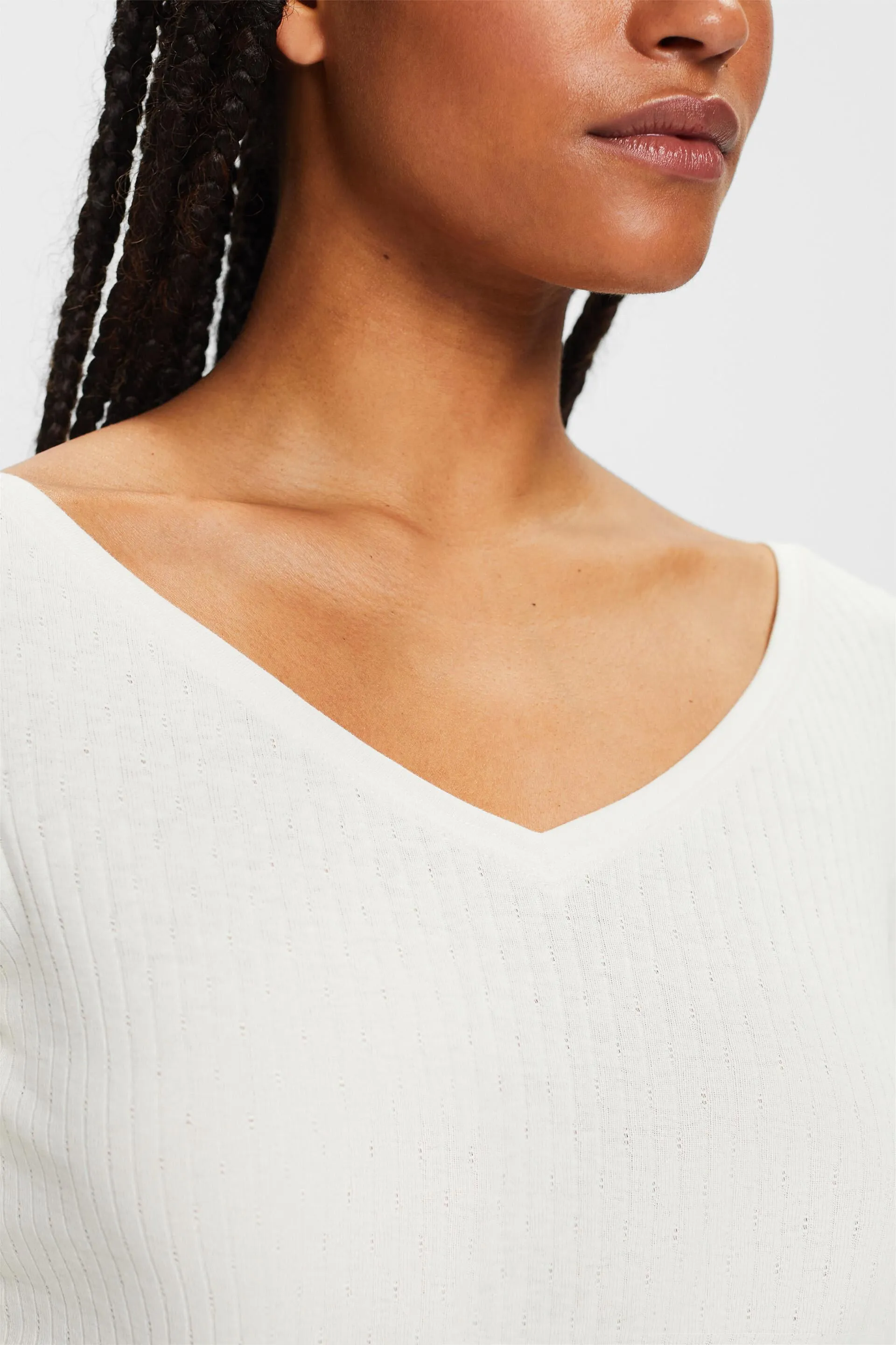 Top a pointelle con scollo a V